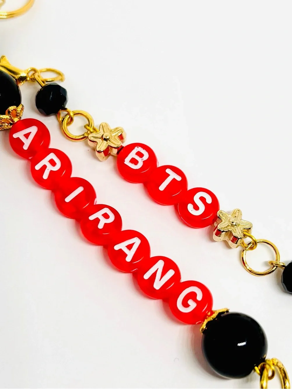 BTS ARIRANG RED GOLD BLACK BEADED KEYCHAIN